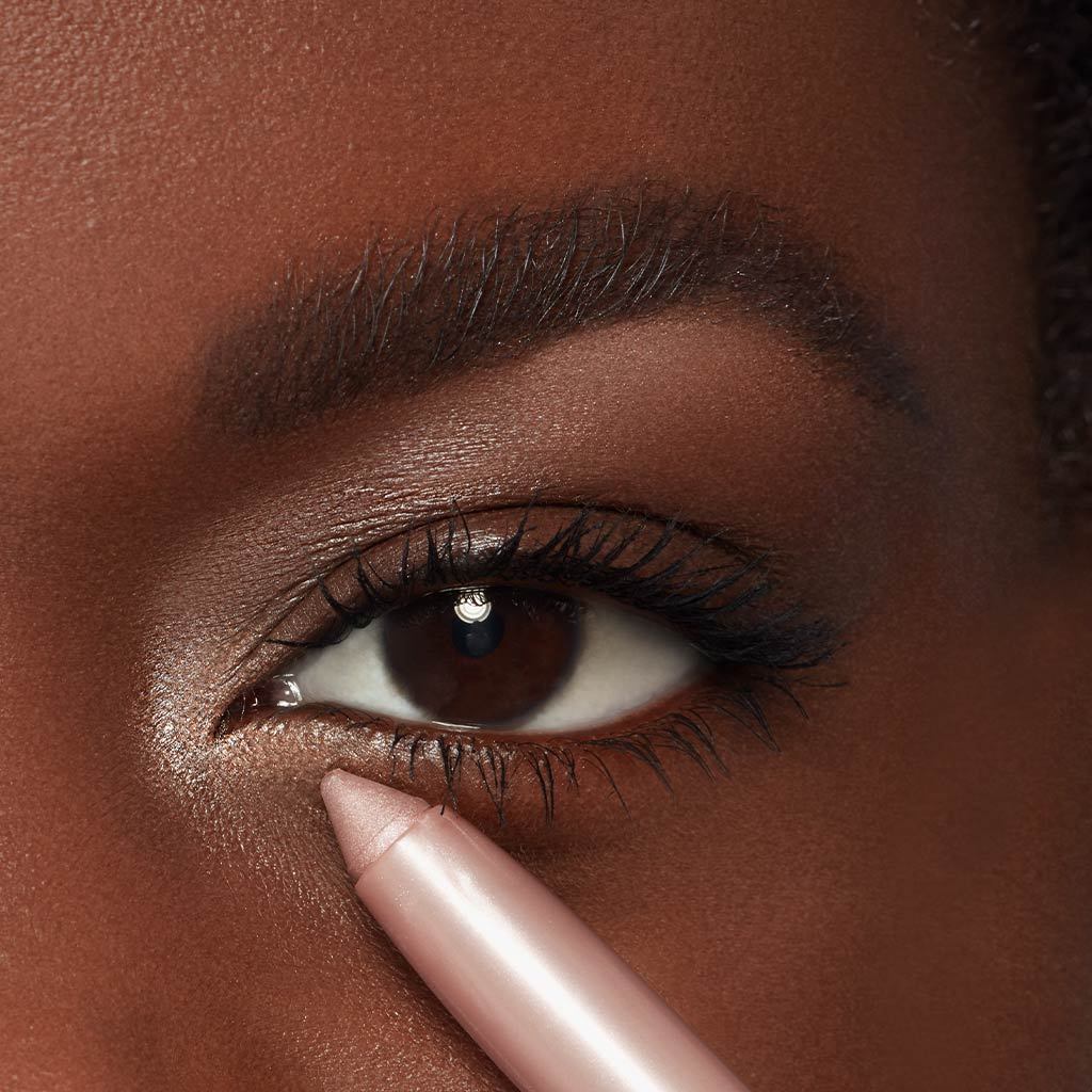 Waterproof eye highlighter applied to inner corner of eye